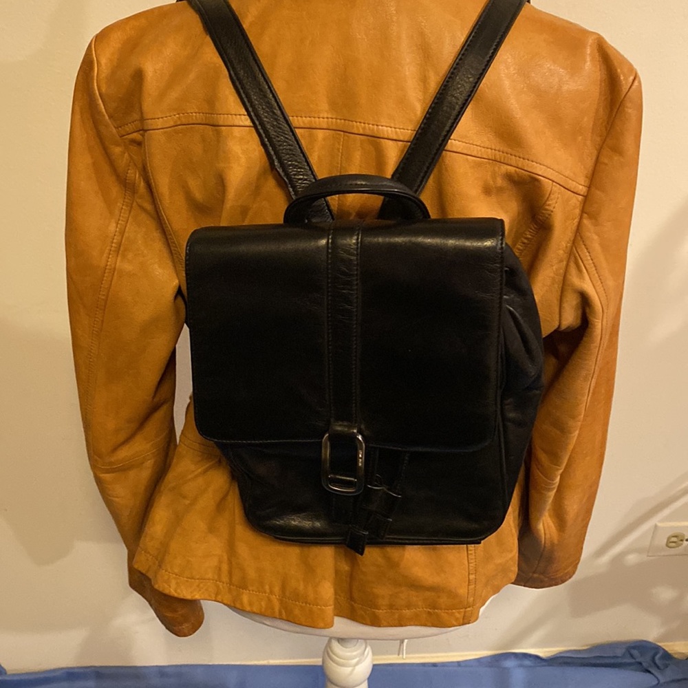 Nine West small genuine leather small backpack.